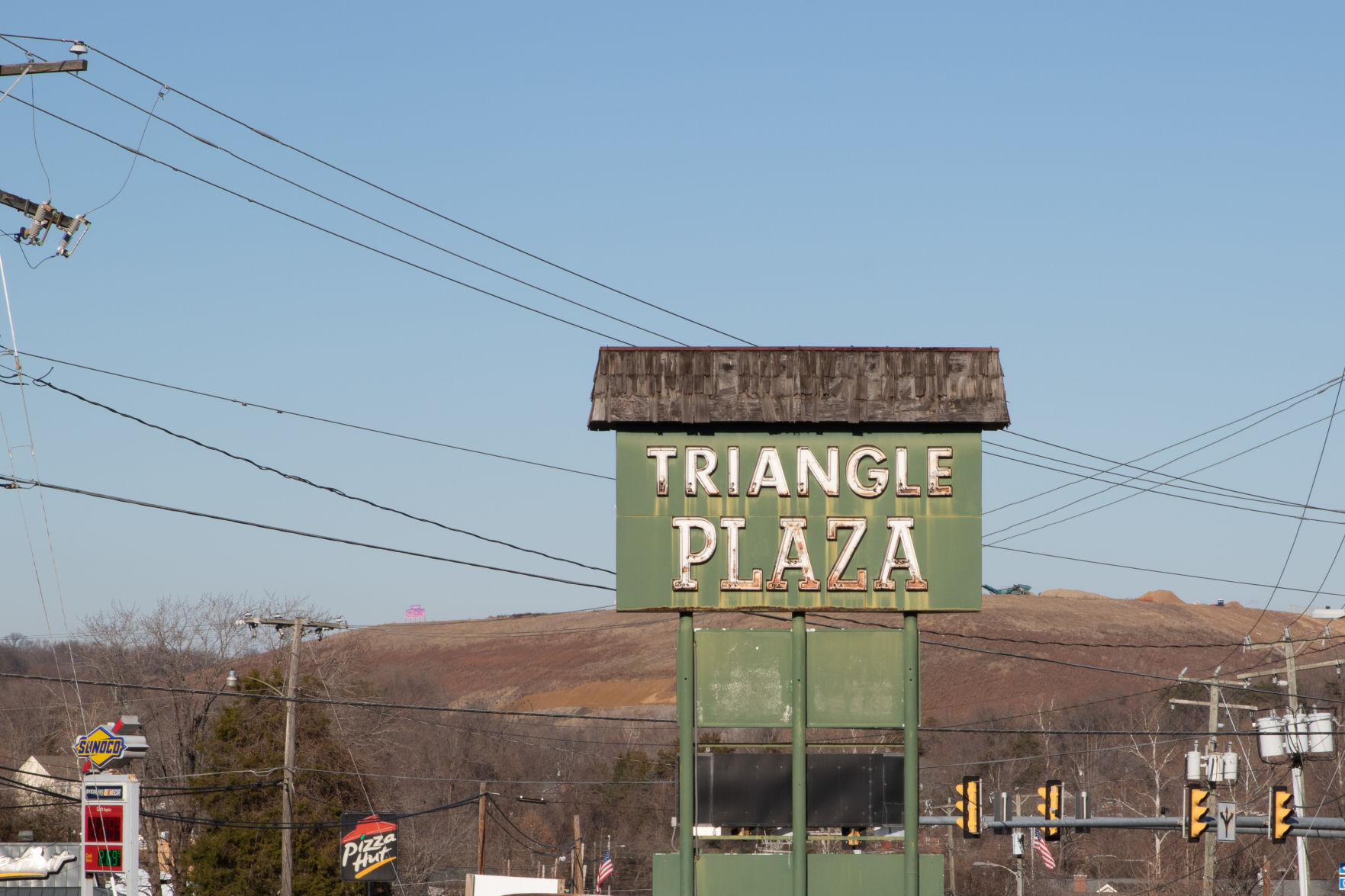 Rosies Gaming Emporium: Triangle Shopping Plaza sign